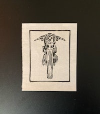 a drawing of a motorcycle on a black surface